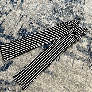 Love Tree Women size medium Black and White striped jumpsuit